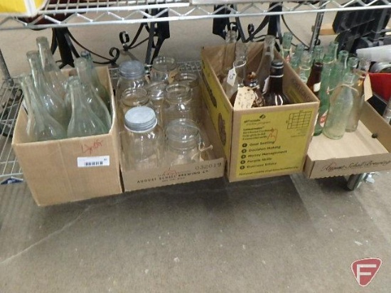 Assortment of jars and bottles, Contents of 4 boxes on bottom shelf of cart
