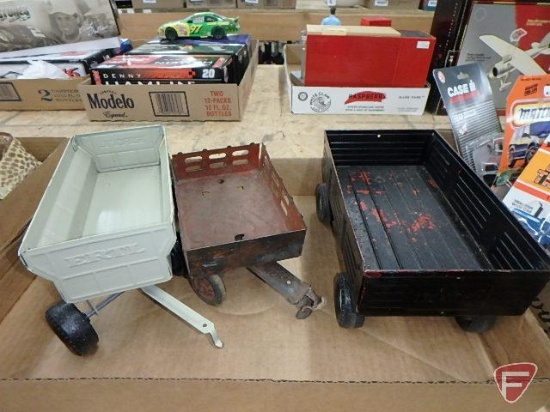 Ertl and other metal trailers, one is painted