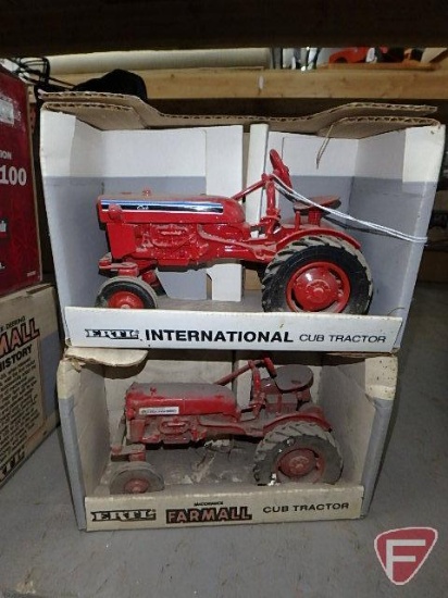 International Cub tractor, no. 48, Farmall Cub tractor, no. 235, soiled'
