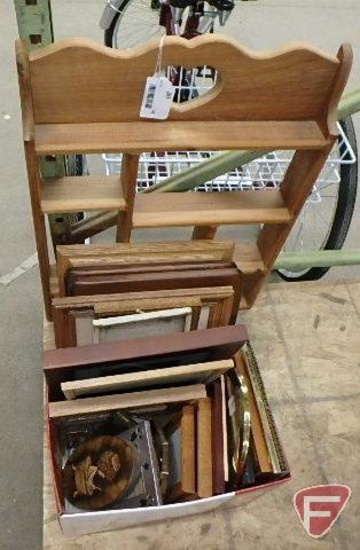 Assortment of frames and wood wall shelf