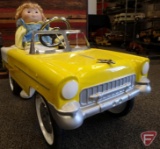 Yellow and white two tone pedal car with doll