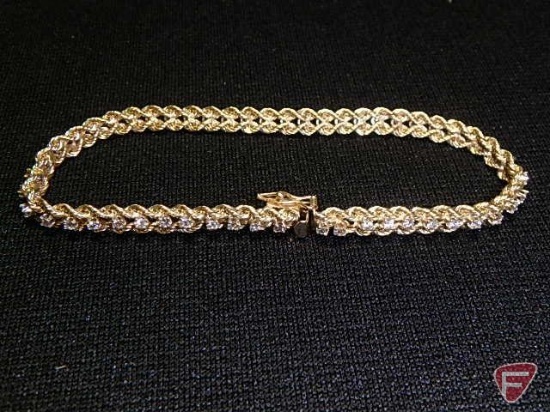 Ladies 14k yellow Gold 6" tennis bracelet with (52) CZ stones (5.6 dwt)