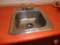 Stainless steel hand sink, mounted to counter