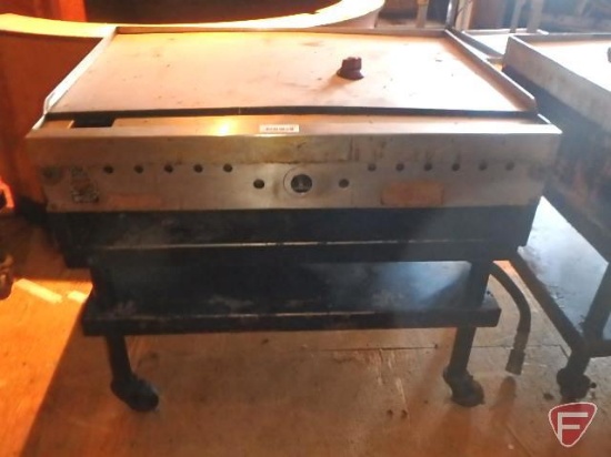Wolf gas griddle on casters, 24"x36" griddle, 28-1/2"x36"x31"H with exhaust hood