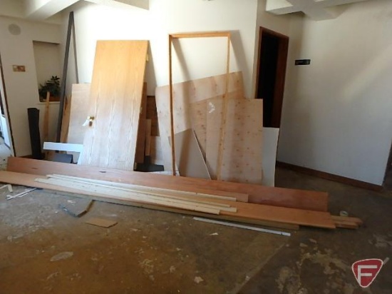 Scrap wood/lumber, felt paper, door, door frame, plywood sheet, coated wall board