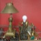 Brass lamps and one aluminum ship lamp