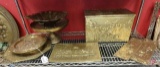 Brass cake stand, bowl, and relief wall hangings and box, whole shelf