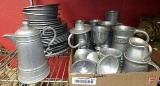 Pewter plates, bowls, cups, stein, candleholders