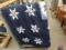 Quilt: blue with wolf, snowflake, and USA flag design