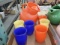 Bright orange colored glass pitcher and various colored glasses-6