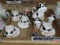 Cow themed tea set, with (4) cup/saucers, and decorative figurines. Contents of 2 boxes