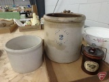 No. 2 crock with hairline cracks at base and rim, other crock with chip in rim, crock candle,