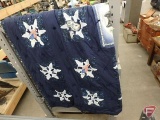 Quilt: blue with wolf, snowflake, and USA flag design