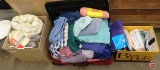 Blankets, towels, rugs, table linens, bed linens. Contents of 2 boxes and rolling suitcase