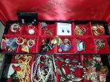 Assortment of ladies jewelry, earrings, pins, pendants, bracelets, necklaces.