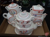 (3) Porcelain stacking tea sets. Contents of box.