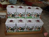 (2) rooster spice sets on wood shelves, chicken tea set, and rooster stacking tea set.