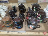 Brown stacking tea sets and one stacking condiment set. Contents of 2 boxes