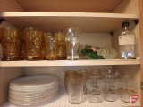 Vintage bottles, Coca Cola glass, amber glass, Fire King plates (both shelves),