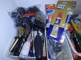 Small hand tools, markers, flashlights, light bulbs, tape (bottom shelf)