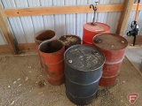 (4) oil barrels, one with spigot, and (2) metal cans. 6 pieces