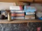 Contents of shelf: ignition wire sets, oiler, antifreeze tester, wire, light head magnifying glass,