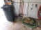 Garbage cans, ice melt salt, tile spade, impact chisel, garden hoses, hose connectors