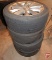 (4) P235/45R18 tires on 5 bolt rim, off of a 2012 Buick Verano