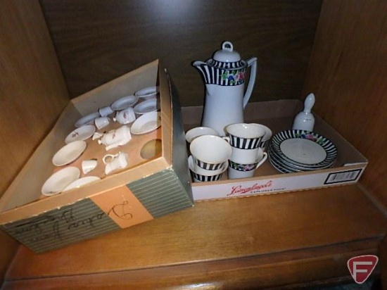 Contents of under storage: pink, green, and yellow depression glassware, (2) miniature tea sets