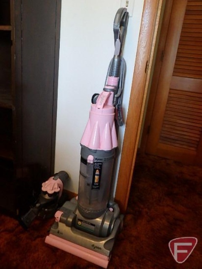 Dyson DC07 Pink vacuum and Dyson DC16 cordless handheld vacuum with charger