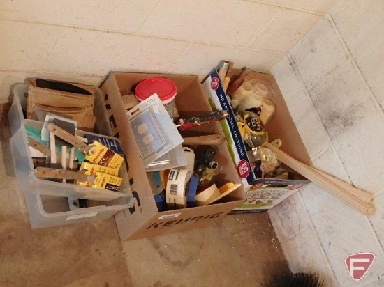 Painting supplies: rollers, brushes, mixing sticks, outlet covers, tape, roller handles,