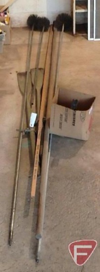 Antique shoe repair stand, chimney brushes, duck boat oars, fuel tank ruler