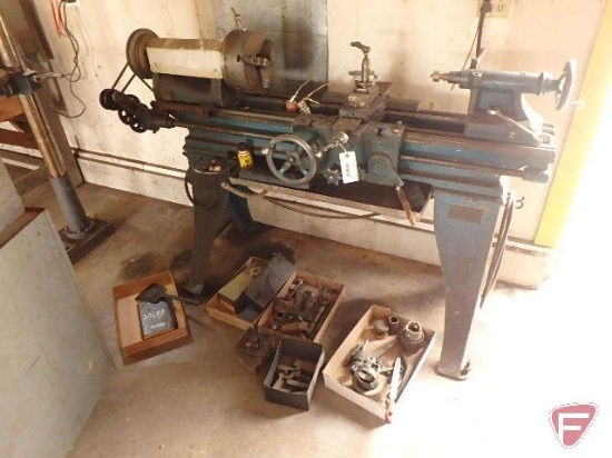 South Bend lathe on cast iron stand, 3 jaw chuck, 28" from chuck to live center,