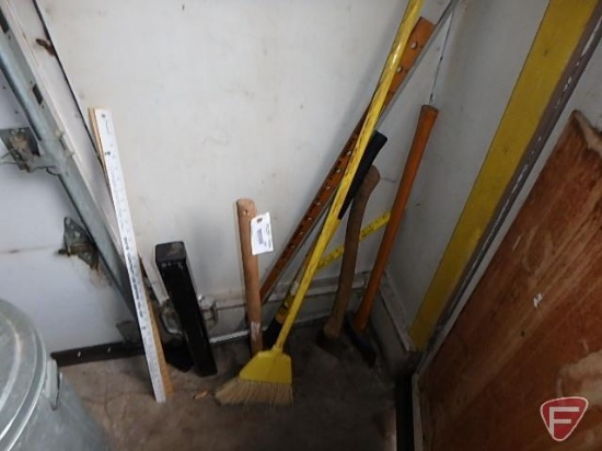 Fence post pounder, yard sticks, broom, hatchet, splitting maul