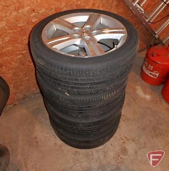 (4) P215/45R17 tires on 5 bolt rim, off of a 2009 Pontiac Vibe