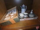 Contents of under storage: pink, green, and yellow depression glassware, (2) miniature tea sets