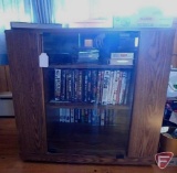 Media cabinet and contents: DVDs, VHS tapes, CDs,
