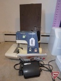 White Superlock 503 sewing machine serger with manual, pedal, and power cord
