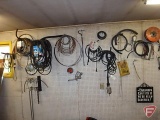 Contents of section: v-belts, rubber tubing, trouble work light, grandpa fixit sign,