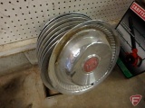 (8) Buick hubcaps