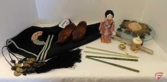 Oriental table covering with tassels on corners, jade hair stick/chopsticks, oriental doll on stand,