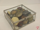 Glass box with vintage some celluloid buttons, some glass
