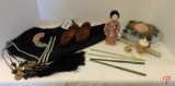 Oriental table covering with tassels on corners, jade hair stick/chopsticks, oriental doll on stand,