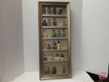 Display box with unique collection of oriental snuff jars. 29inHx12inWx3inD.