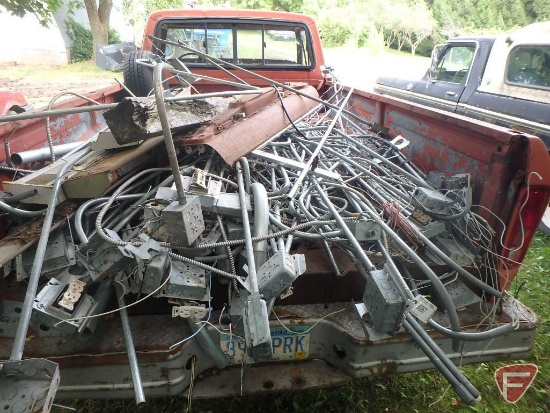 Contents of LN 6062 pickup truck bed: used electrical conduit, some electrical boxes