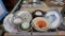 Misc. plates, stoneware nesting bowls, orange and gray enamel dish, cookie jar, tea pot