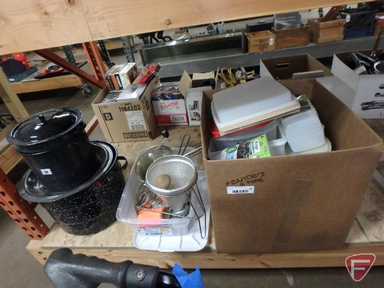 Enamel canners, mashers, jar lids, and plastic storage containers, some Tupperware.