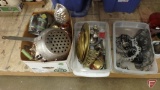 Metal kitchen items: bundt pans, cake form, flour sifter, metal napkin holder,