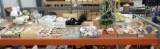 Christmas decoration: miniature artificial tree, ornaments, brush wreaths, santas