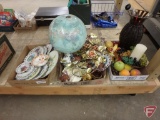 Collector plates, globe, metal wall hangings, and artificial fruit